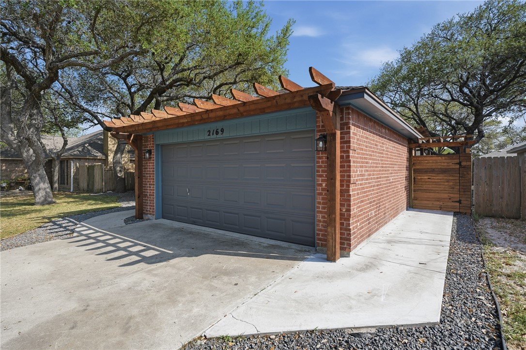 2169 Timberleaf Circle Ingleside, TX 78362 - Photo 3 of 36 a view of a house with a yard