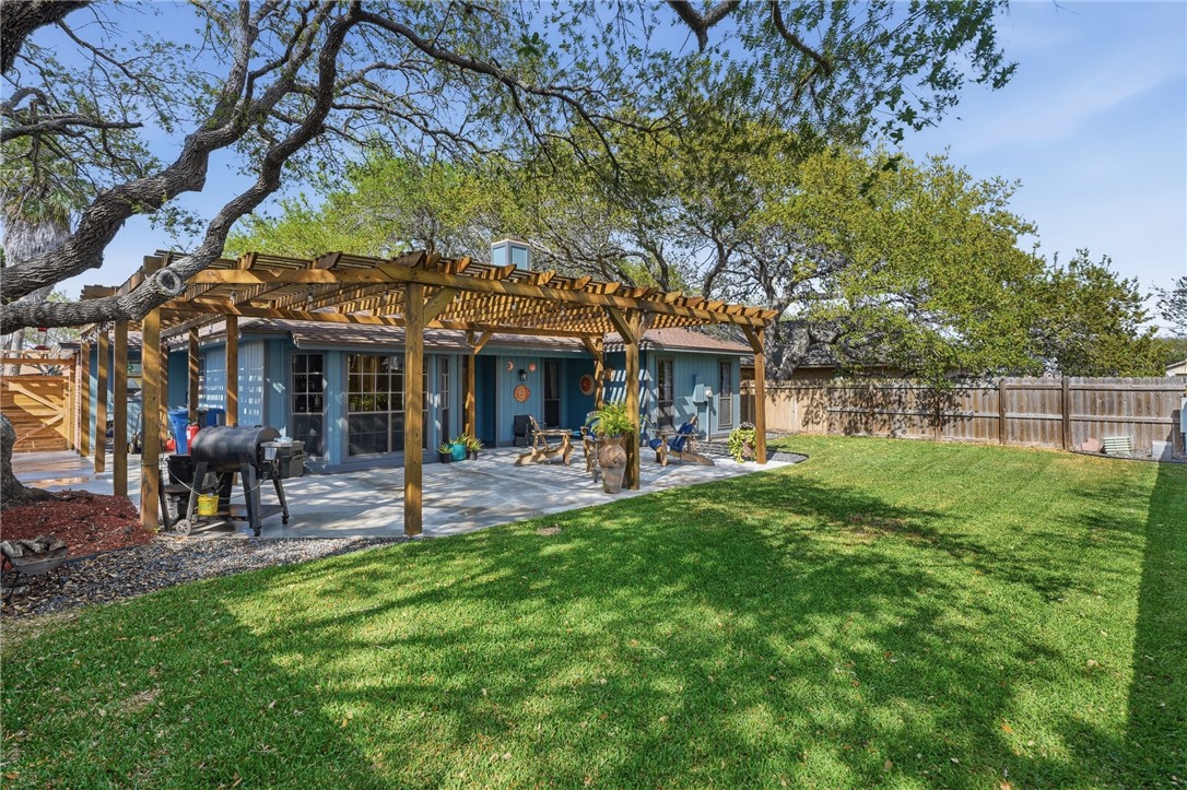 2169 Timberleaf Circle Ingleside, TX 78362 - Photo 31 of 36 a view of a house with a yard porch and sitting area