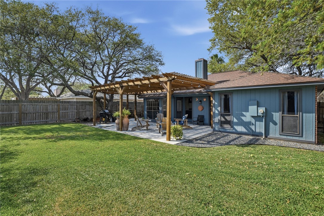 2169 Timberleaf Circle Ingleside, TX 78362 - Photo 33 of 36 a view of a house with a yard porch and sitting area