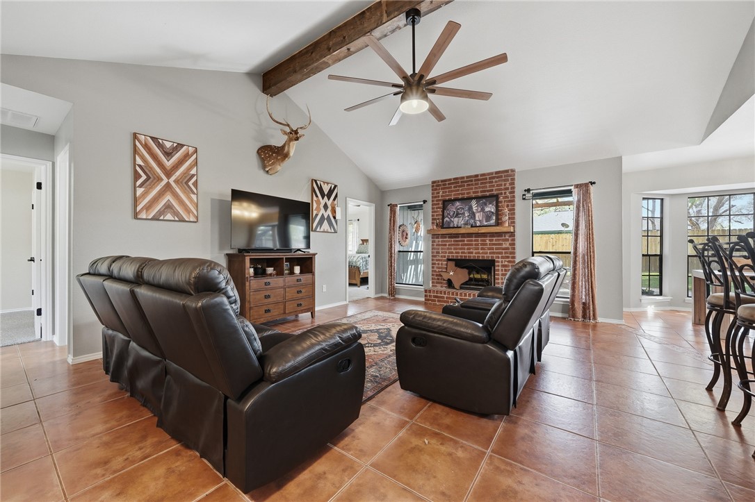 2169 Timberleaf Circle Ingleside, TX 78362 - Photo 6 of 36 a living room with furniture and a flat screen tv