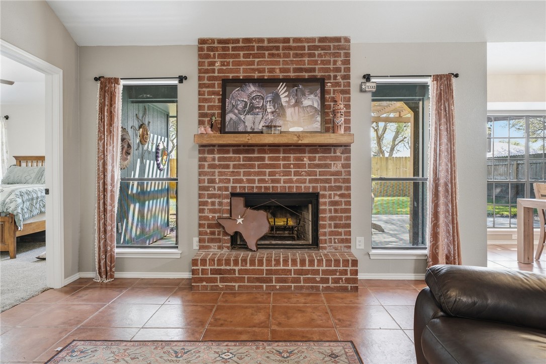 2169 Timberleaf Circle Ingleside, TX 78362 - Photo 8 of 36 a living room with furniture and a fireplace