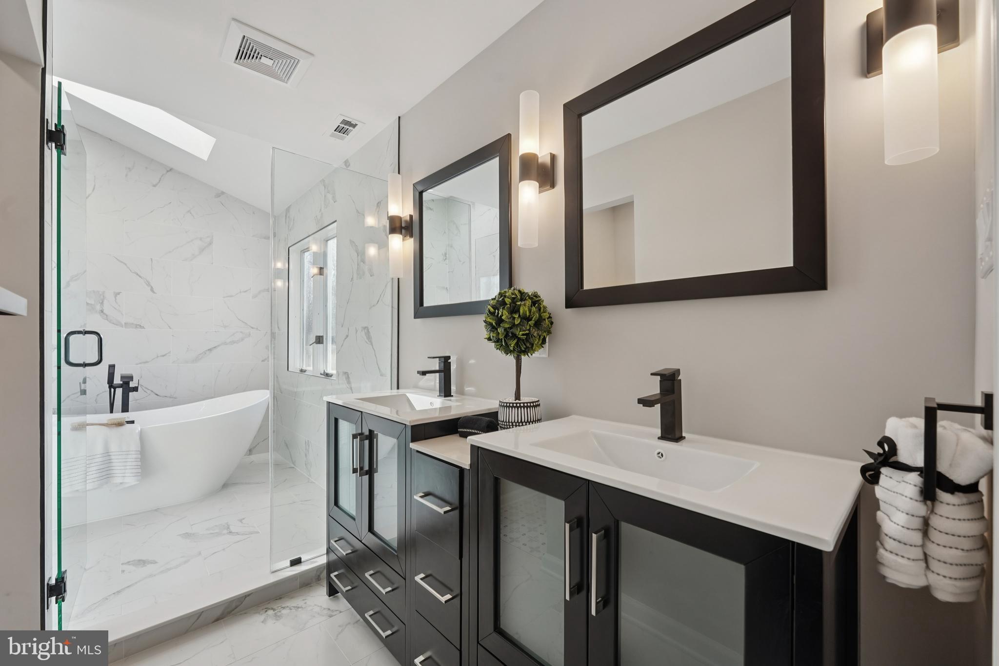 2839 Garwood Road Sicklerville, NJ 08081 - Photo 12 of 23 a bathroom with a double vanity sink mirror and bathtub