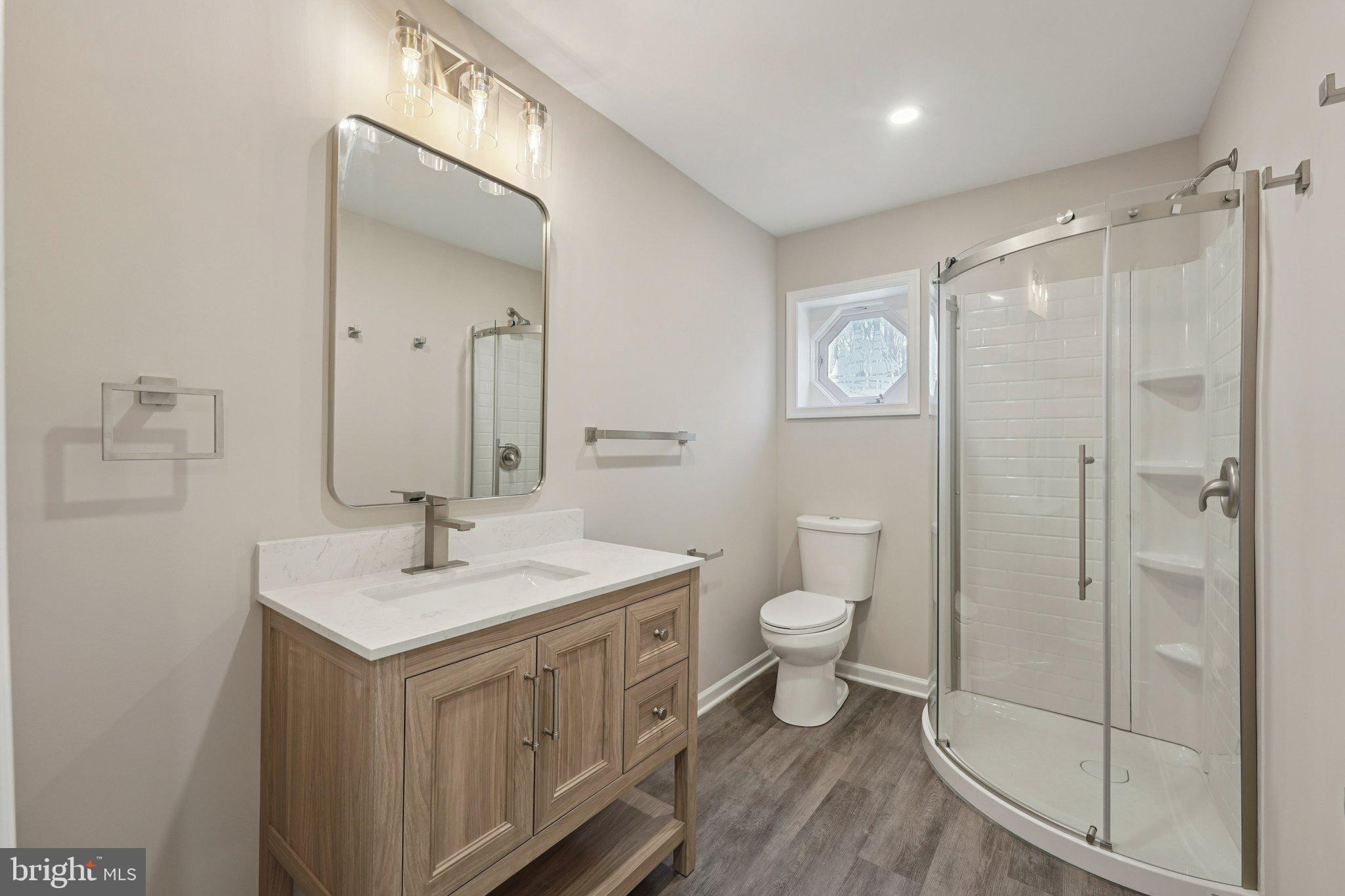 2839 Garwood Road Sicklerville, NJ 08081 - Photo 20 of 23 a bathroom with a sink a toilet and shower