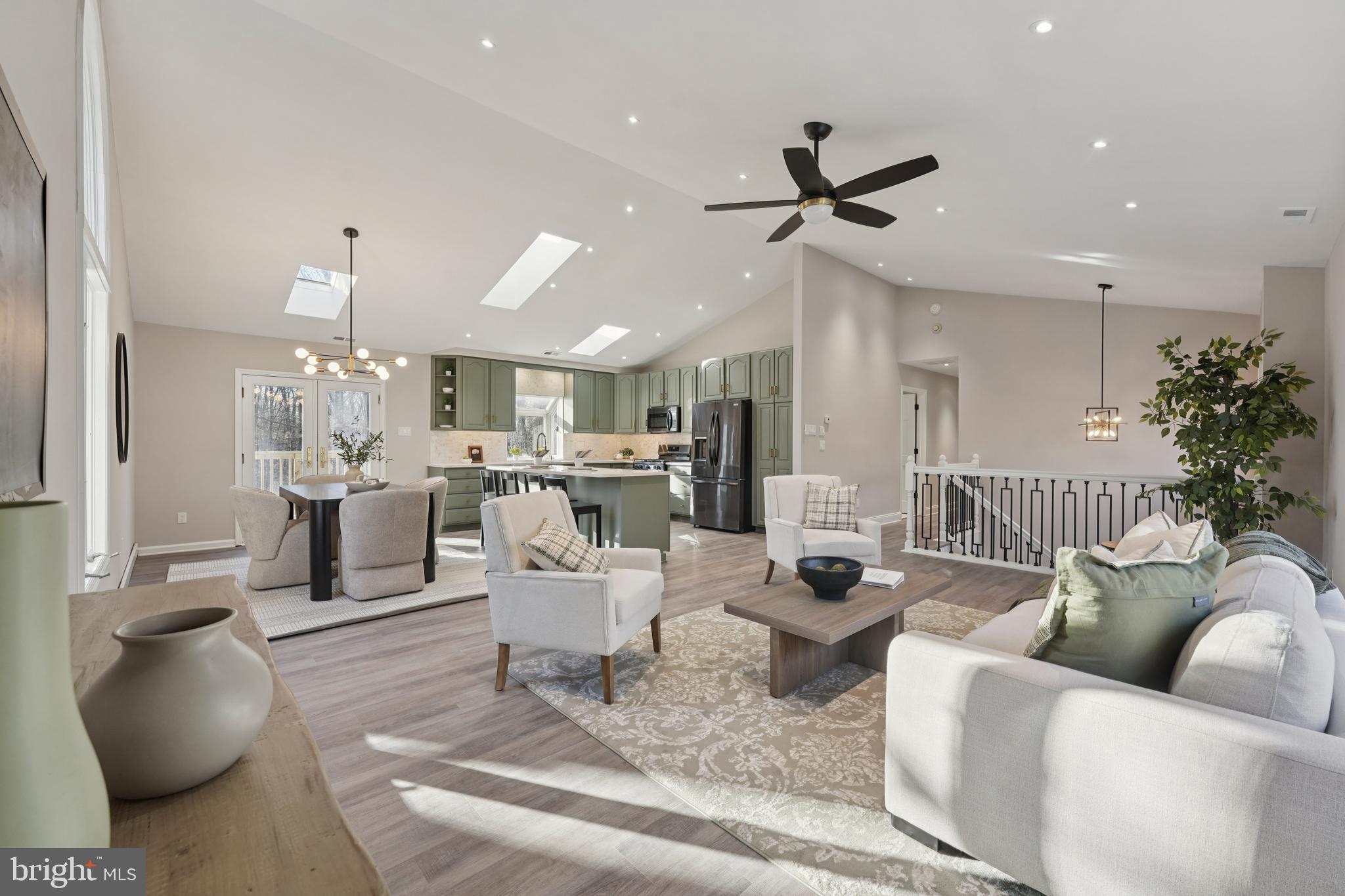 2839 Garwood Road Sicklerville, NJ 08081 - Photo 7 of 23 a living room with furniture and a chandelier