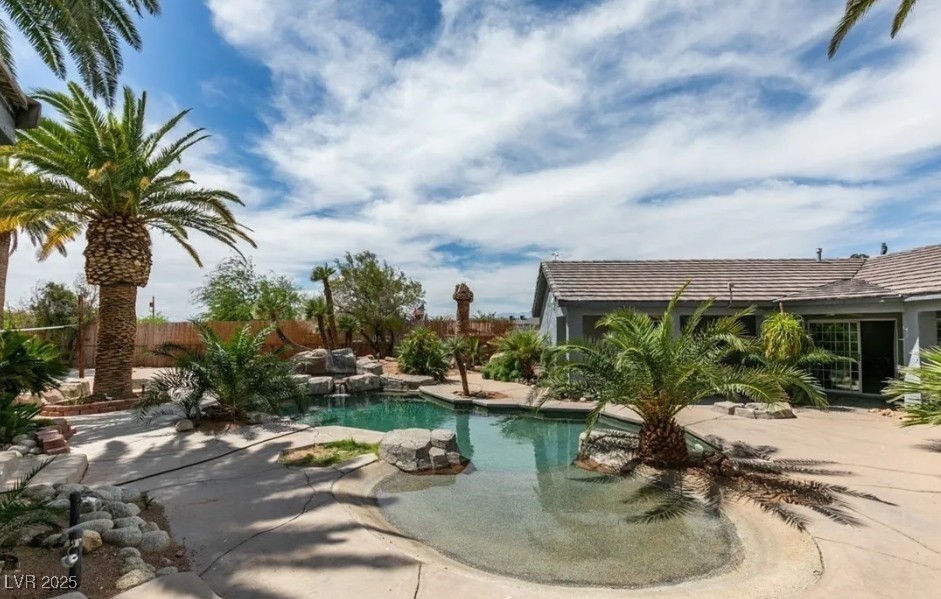 6520 Turtle Hill Road Las Vegas, NV 89110 - Photo 54 of 59 Outdoor pool with a patio area and a fenced backyard