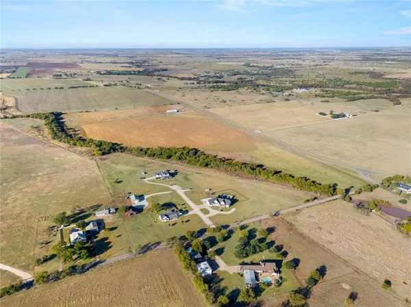 an aerial view of beach and ocean