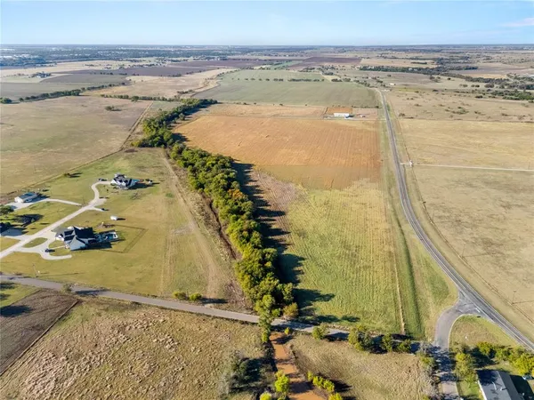 an aerial view of beach and ocean