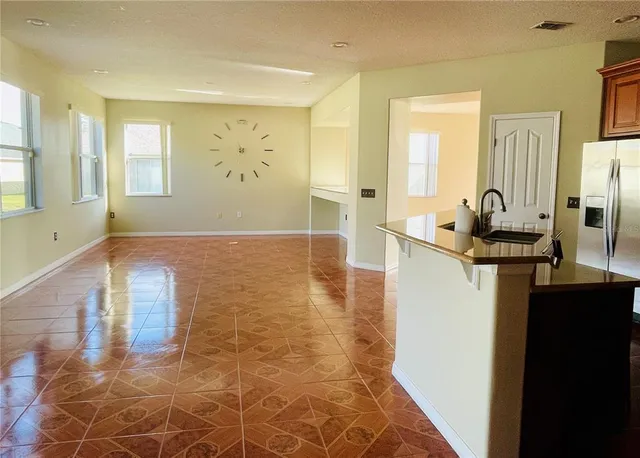 a view of a kitchen with a sink