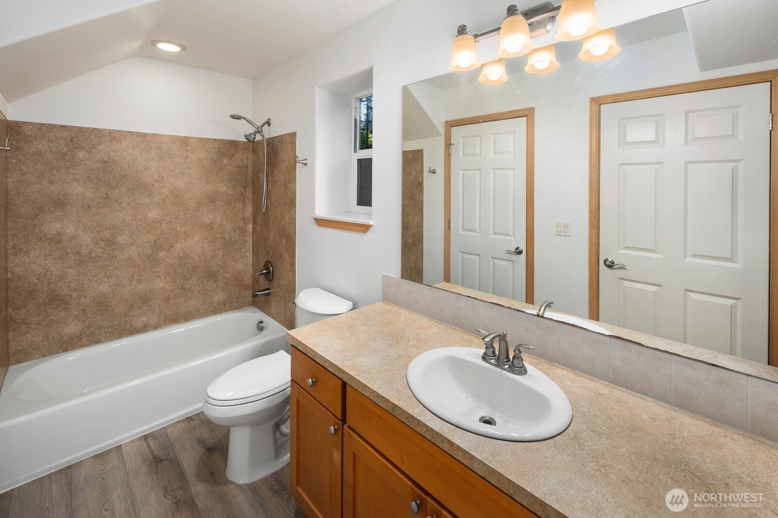 22217 Old Owen Road Monroe, WA 98272 - Photo 28 of 34 a bathroom with a granite countertop sink toilet and shower