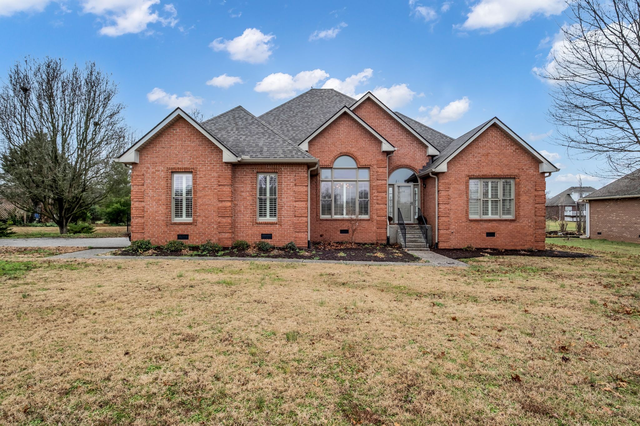 218 Bluefield Lane Lebanon, TN 37087 - Photo 2 of 21 a view of a house with a yard