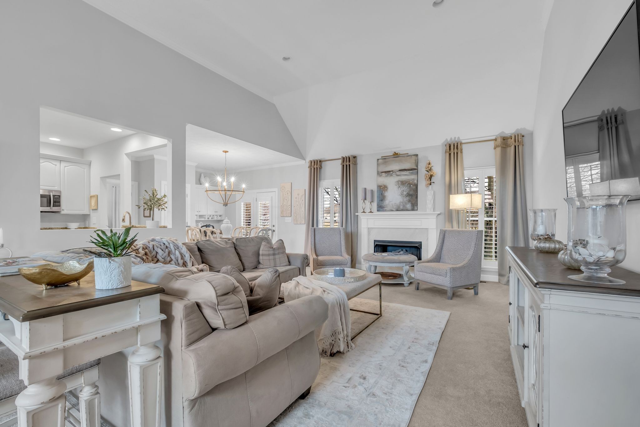 218 Bluefield Lane Lebanon, TN 37087 - Photo 5 of 21 a living room with furniture wooden floor and a fireplace