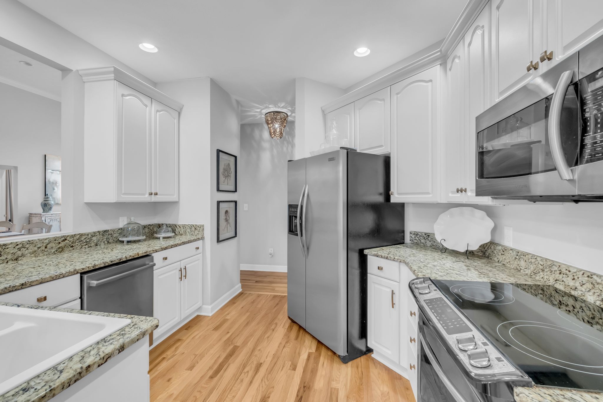 218 Bluefield Lane Lebanon, TN 37087 - Photo 8 of 21 a kitchen with stainless steel appliances granite countertop a refrigerator a stove and a sink