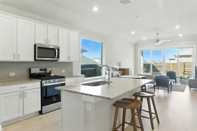 a view of a house with a swimming pool