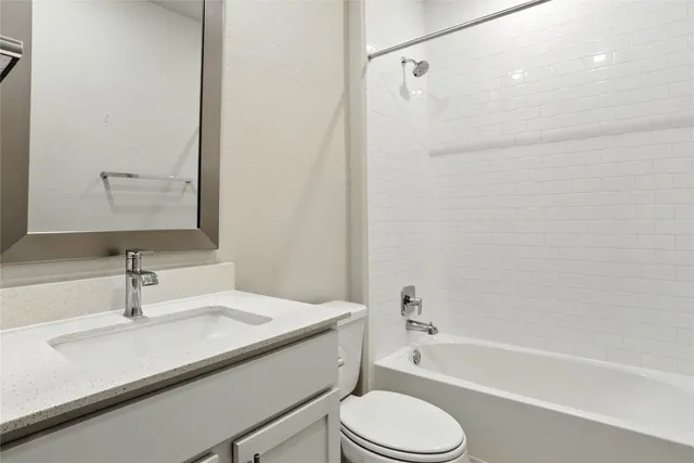 a bathroom with a sink and a bathtub