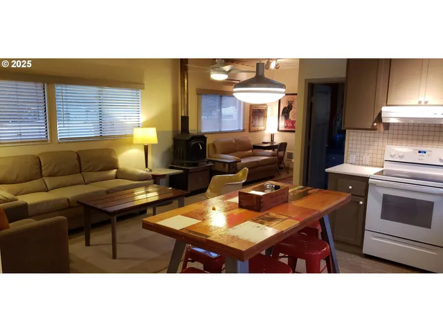 a kitchen with a stove and cabinets