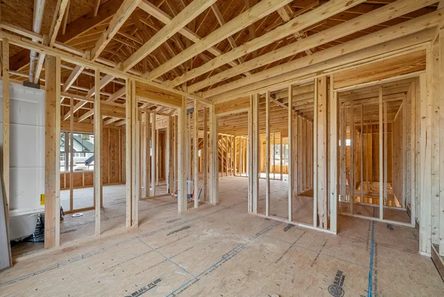 a view of an empty room with a sliding door