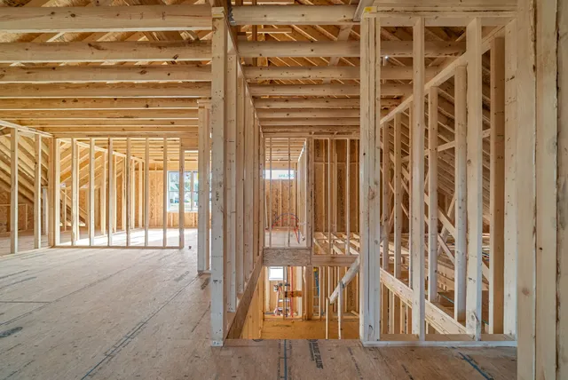 a bathroom with a tub and shower