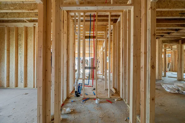 a view of a room with wooden walls