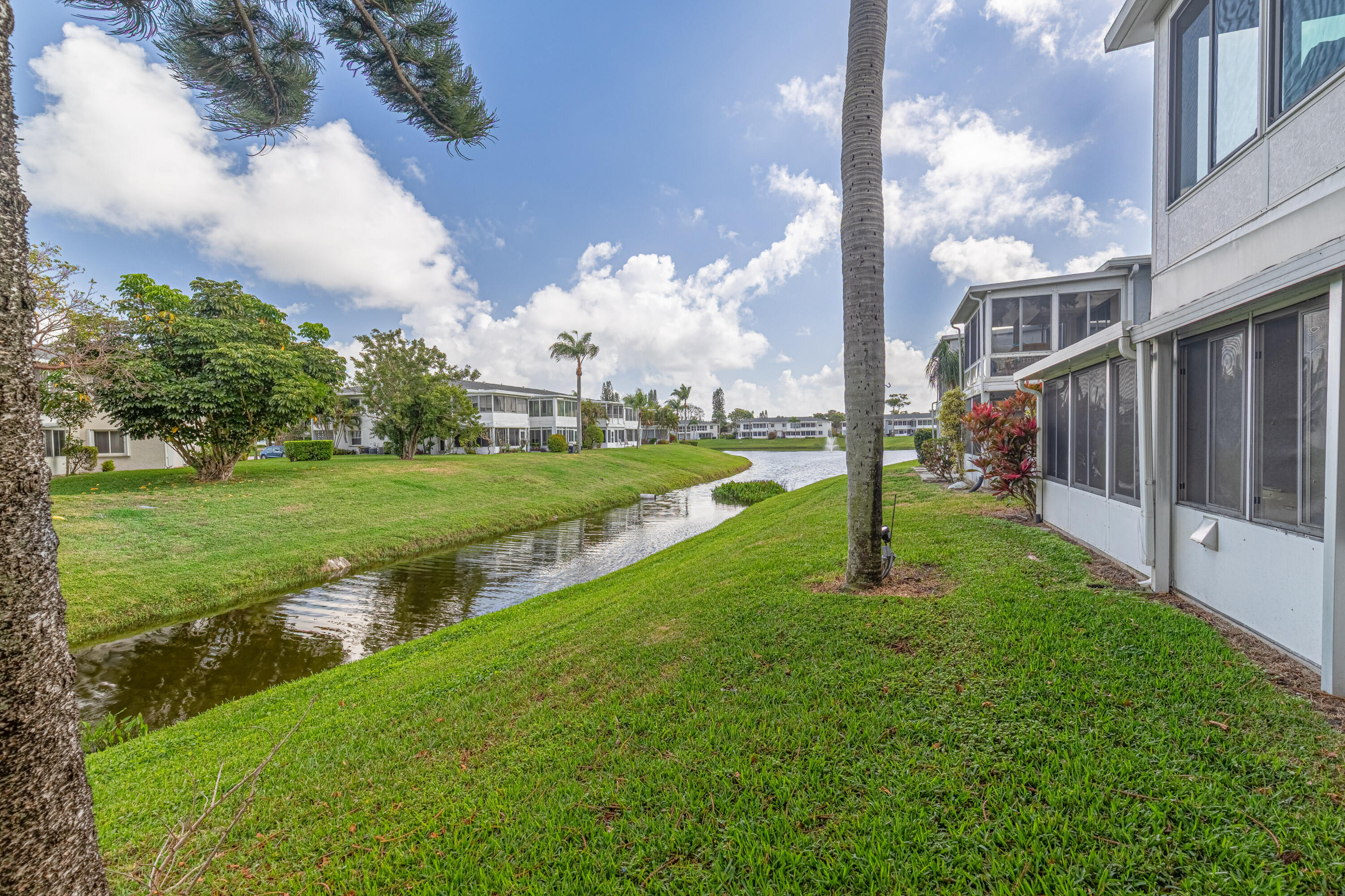 2901 Southwest 15th Street, Unit 102 Delray Beach, FL 33445 - Photo 28 of 59 a view of a park with large trees