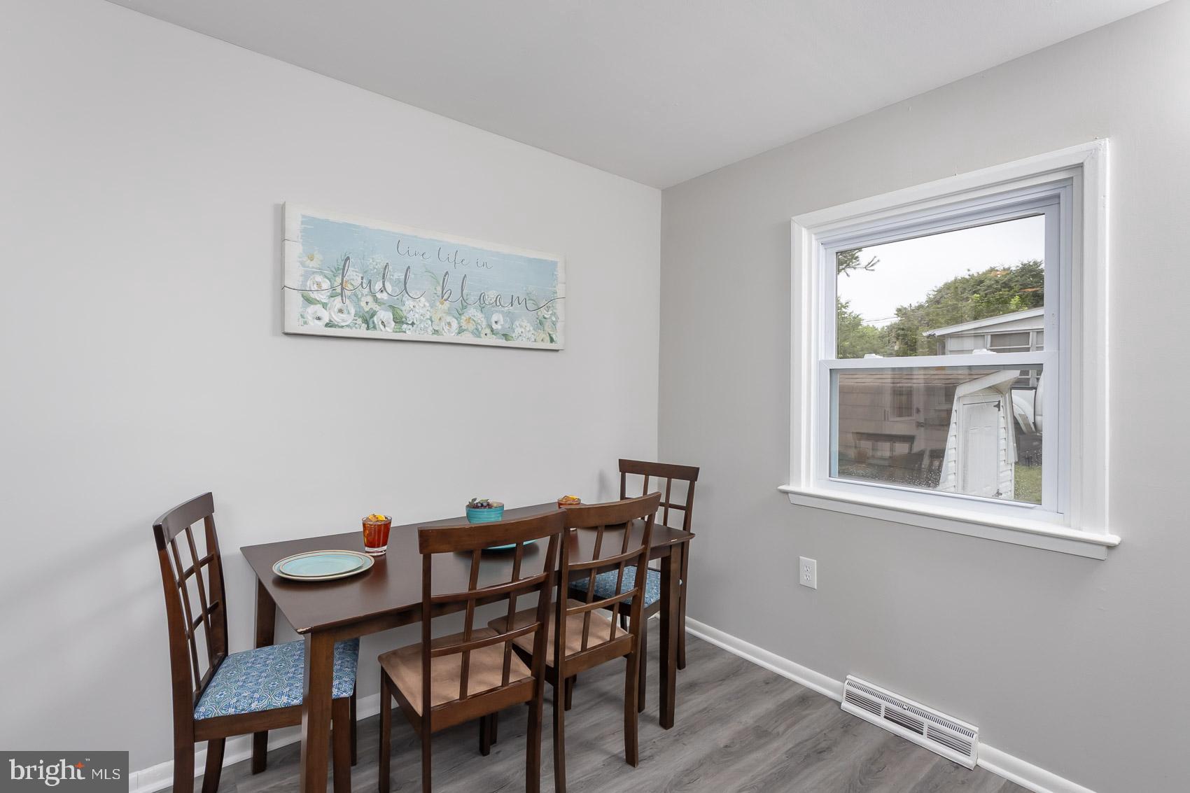 461 Doris Circle Aberdeen, MD 21001 - Photo 16 of 35 a view of a dining room with furniture and a window