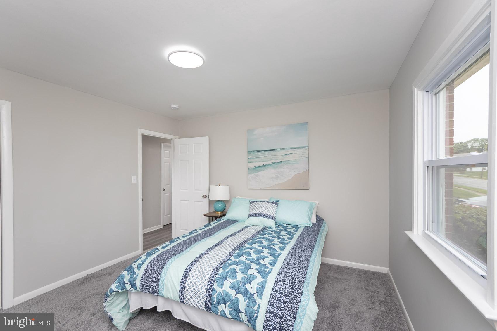 461 Doris Circle Aberdeen, MD 21001 - Photo 22 of 35 a bedroom with a bed and a window