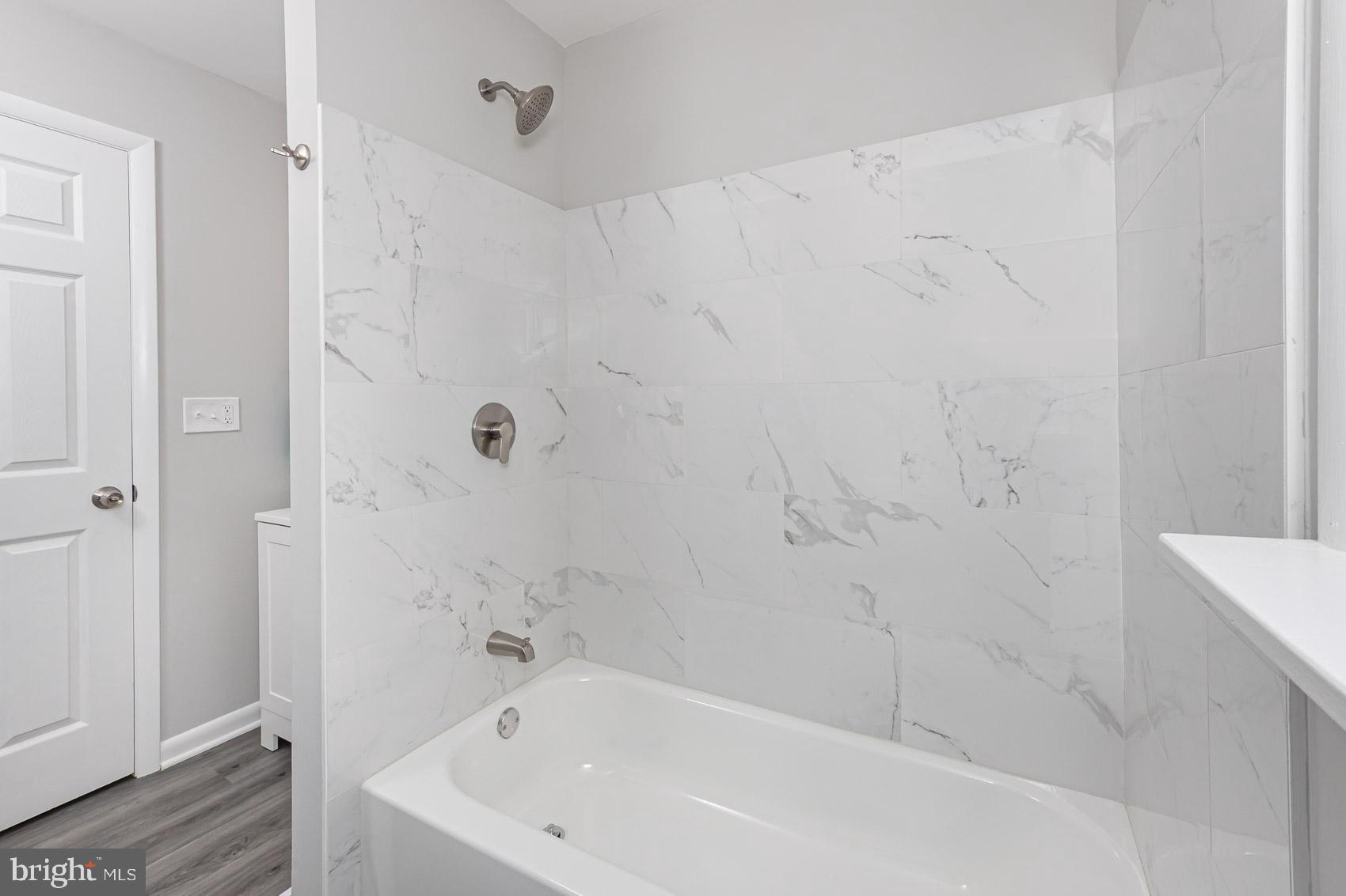 461 Doris Circle Aberdeen, MD 21001 - Photo 30 of 35 a bathroom with a white bath tub