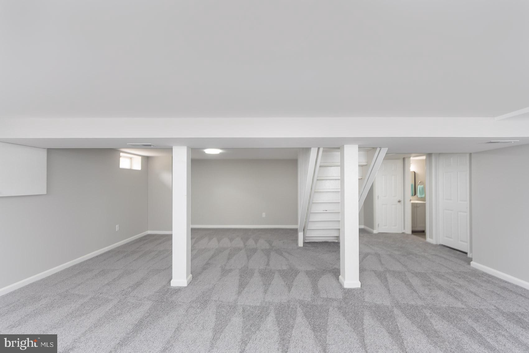 461 Doris Circle Aberdeen, MD 21001 - Photo 33 of 35 an empty room with wooden floor and window