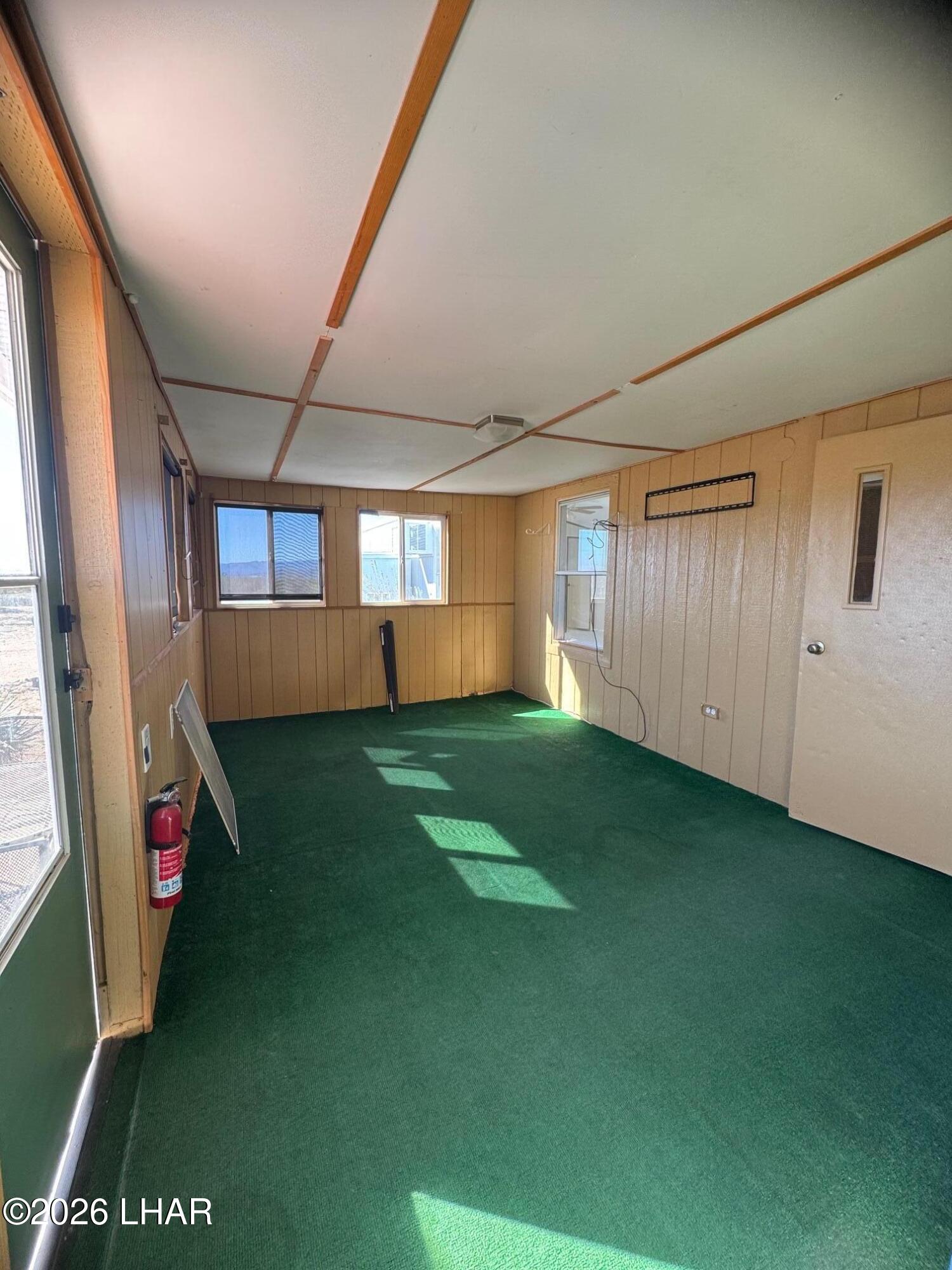 15454 Mohave Road Yucca, AZ 86438 - Photo 29 of 47 a view of an empty room with a window