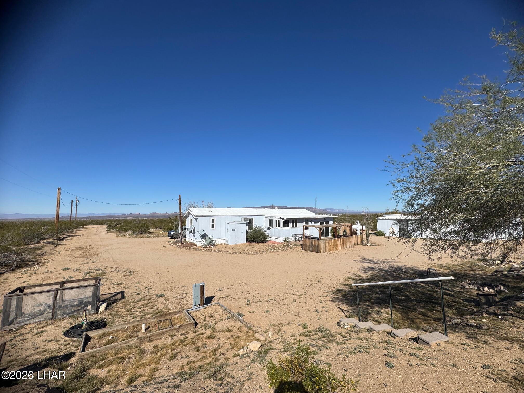 15454 Mohave Road Yucca, AZ 86438 - Photo 36 of 47 a view of ocean with beach