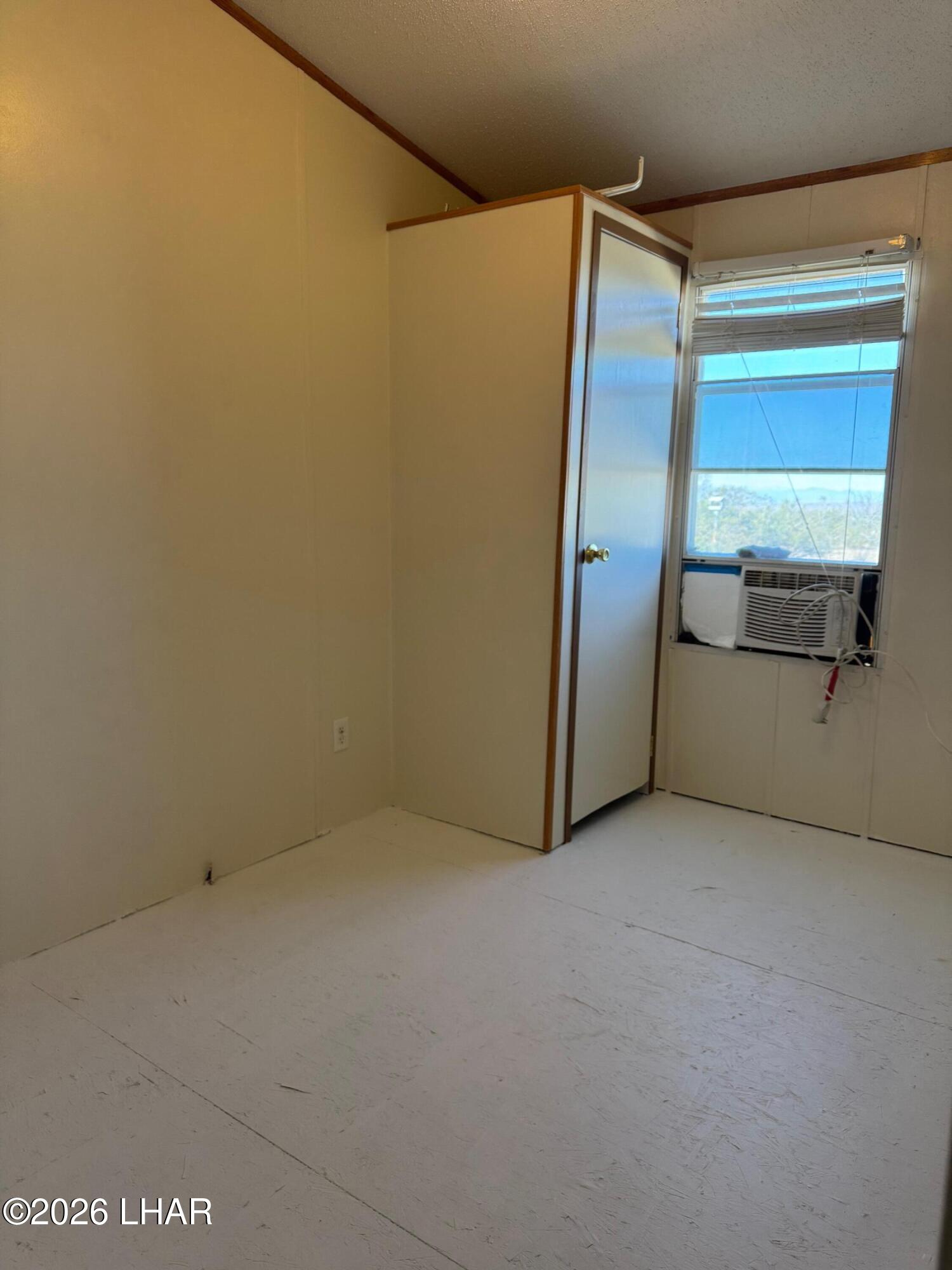 15454 Mohave Road Yucca, AZ 86438 - Photo 5 of 47 a view of an empty room