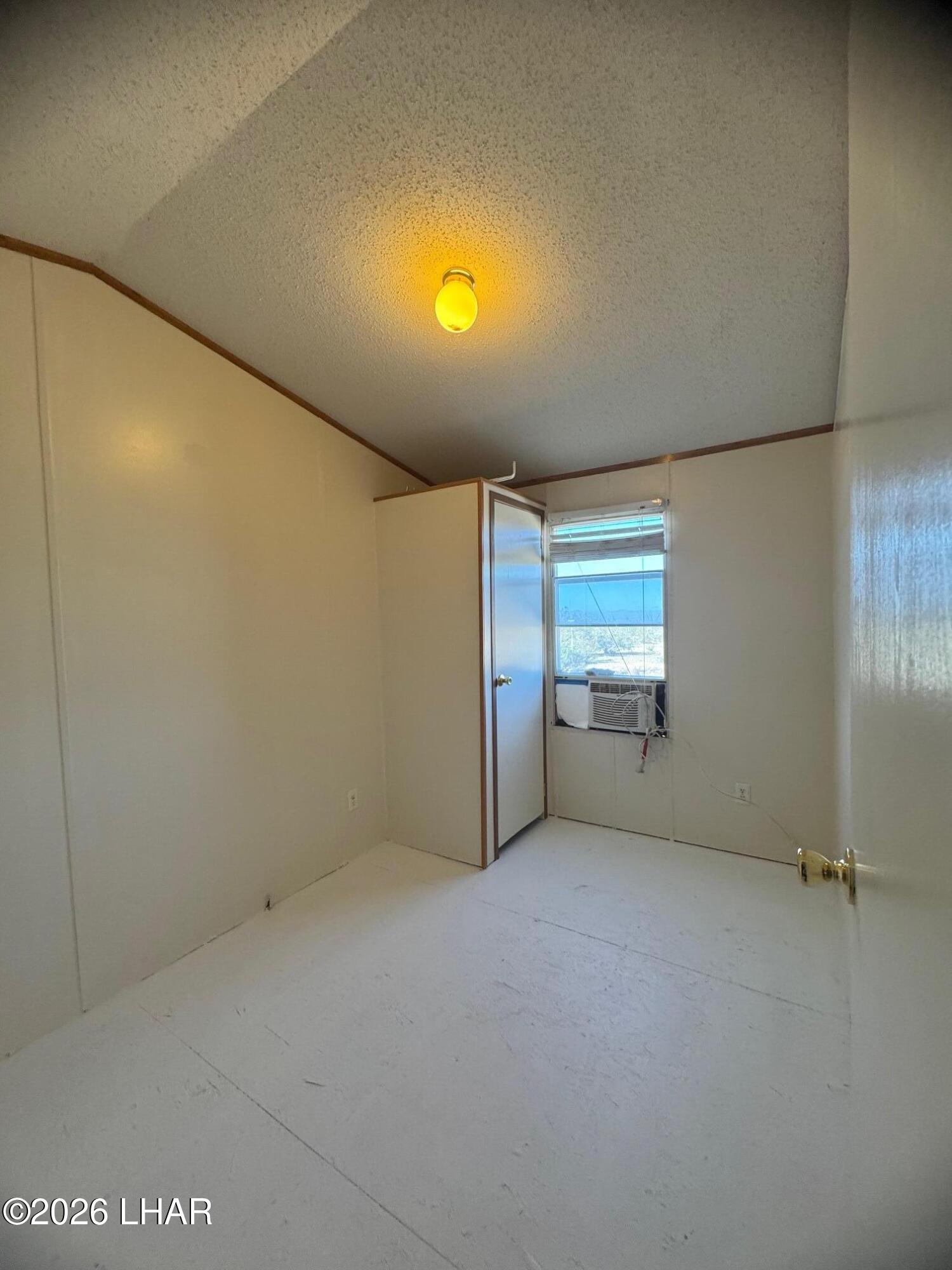 15454 Mohave Road Yucca, AZ 86438 - Photo 7 of 47 a view of empty room