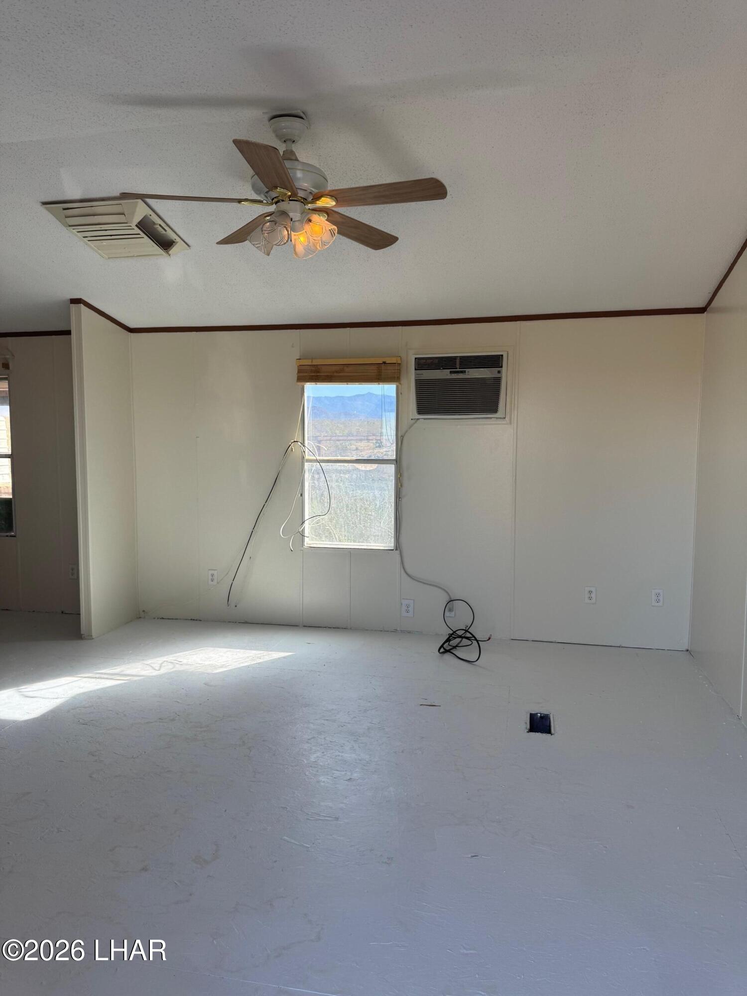 15454 Mohave Road Yucca, AZ 86438 - Photo 10 of 47 a view of an empty room