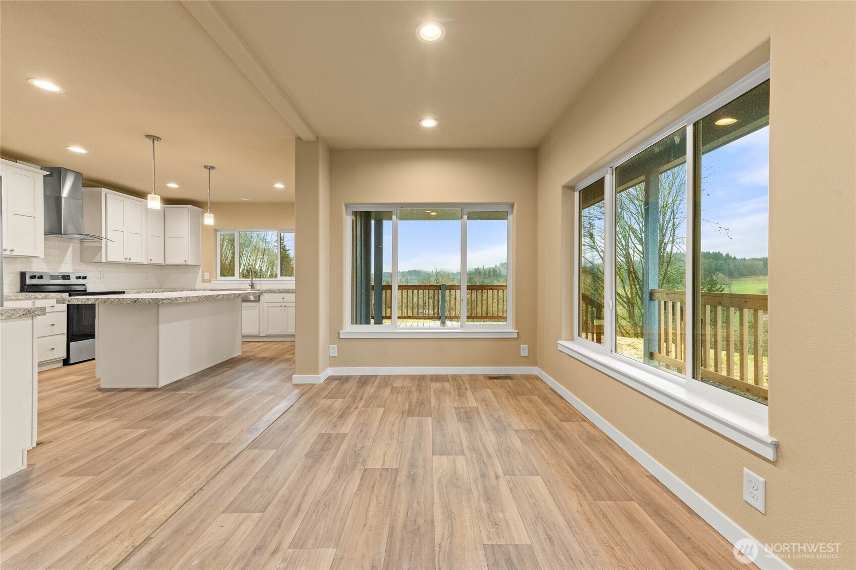 1655 Ferrier Road Winlock, WA 98596 - Photo 15 of 29 a view of a kitchen with wooden floor and outdoor space