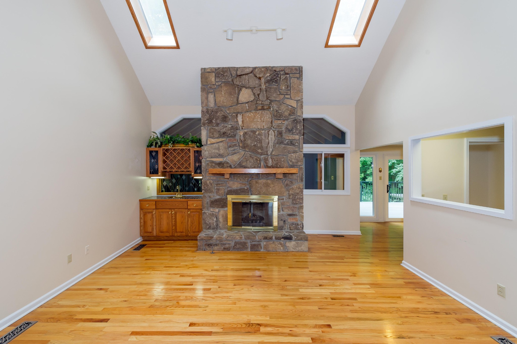 102 Clayton Way Oak Ridge, TN 37830 - Photo 12 of 40 a living room with fireplace furniture and a wooden floor