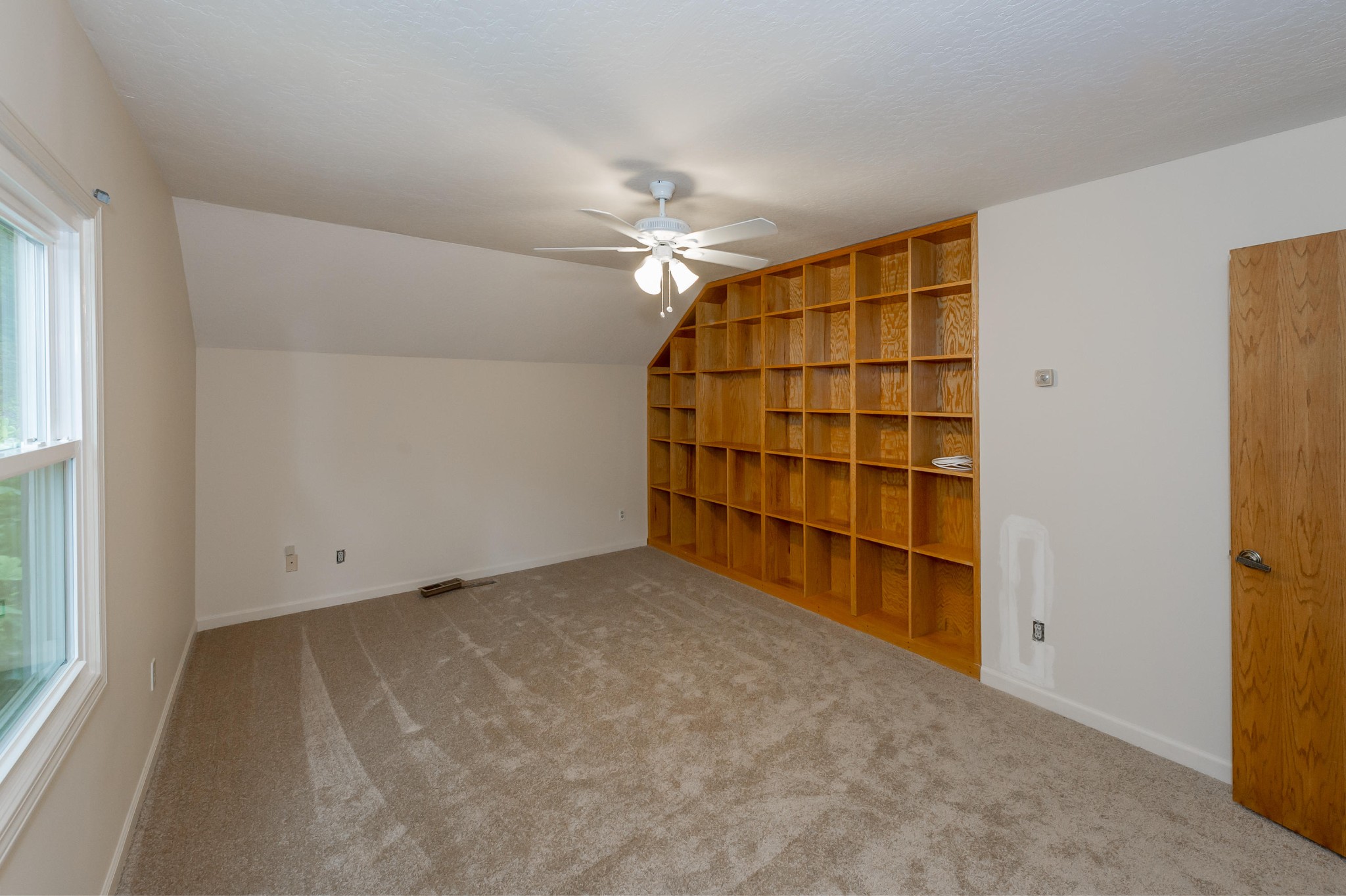 102 Clayton Way Oak Ridge, TN 37830 - Photo 19 of 40 a view of an empty room with a cabinet and a window