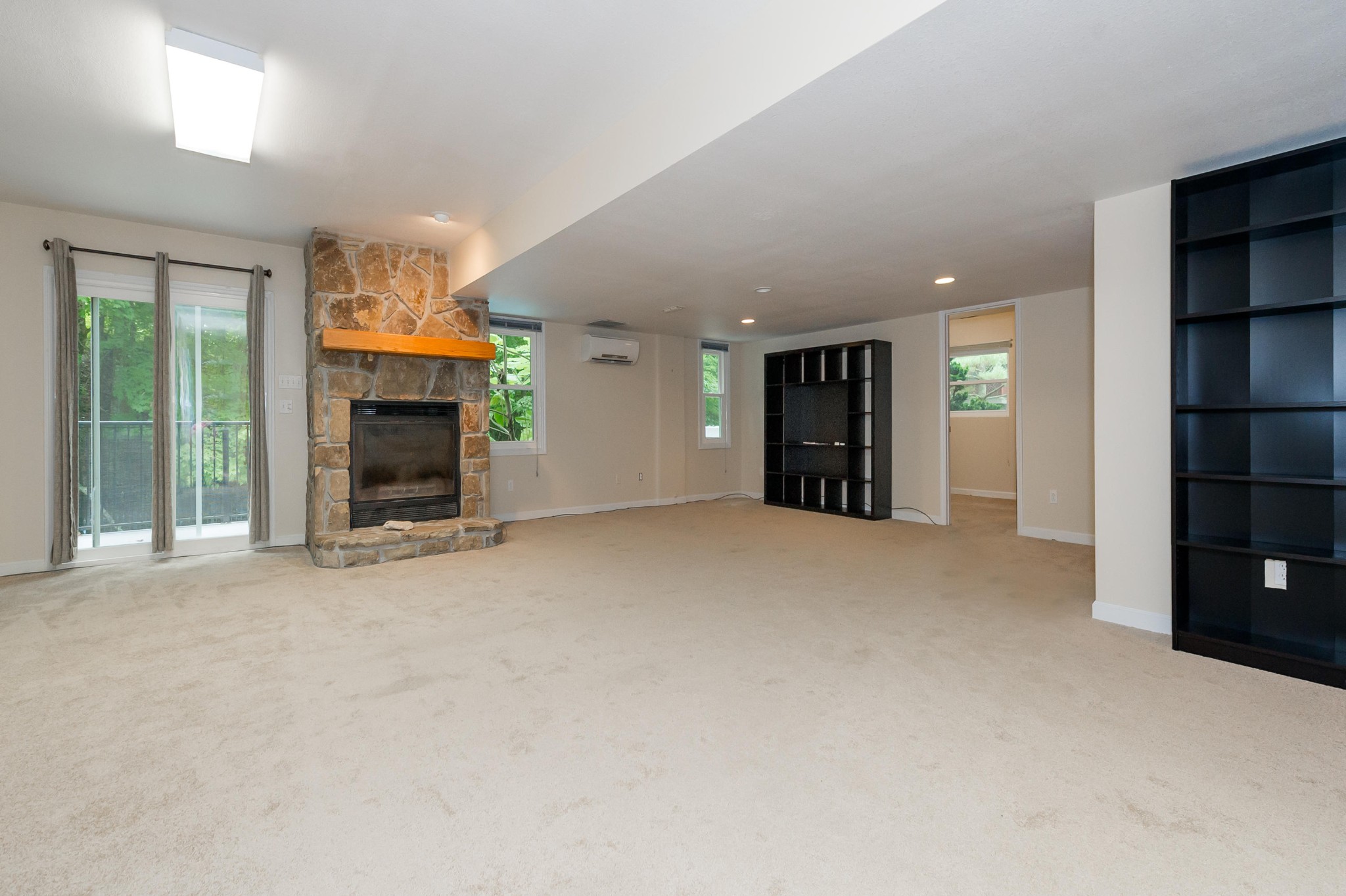 102 Clayton Way Oak Ridge, TN 37830 - Photo 25 of 40 an empty room with a fireplace and window