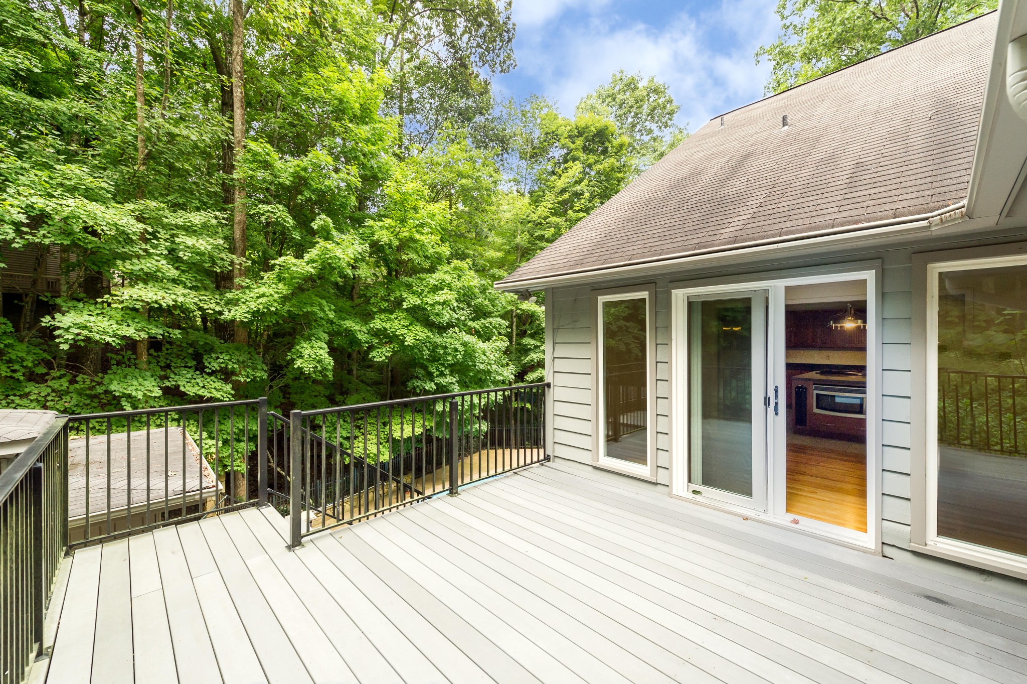 102 Clayton Way Oak Ridge, TN 37830 - Photo 28 of 40 a balcony with wooden floor