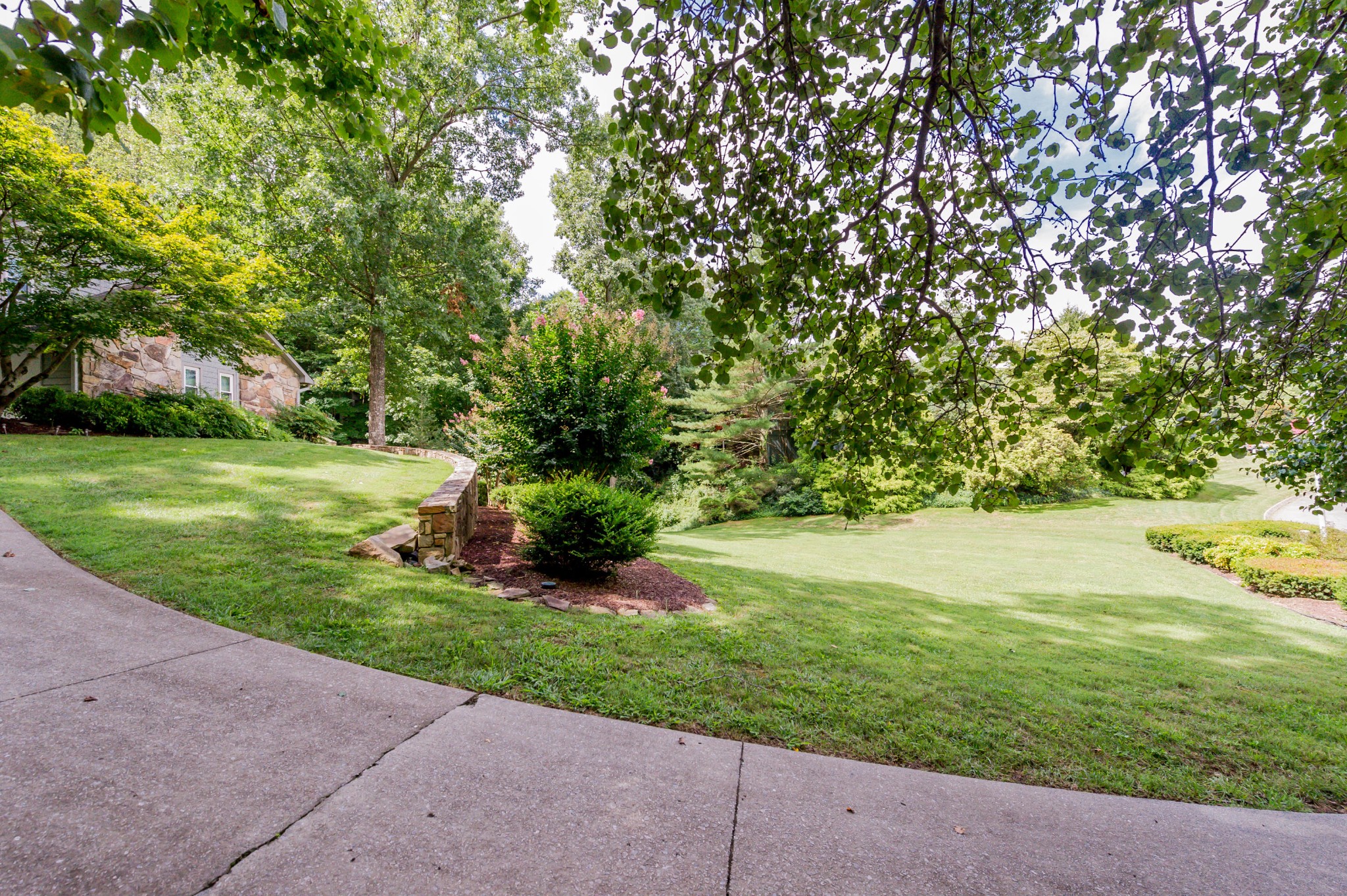 102 Clayton Way Oak Ridge, TN 37830 - Photo 34 of 40 a view of a grassy field with trees