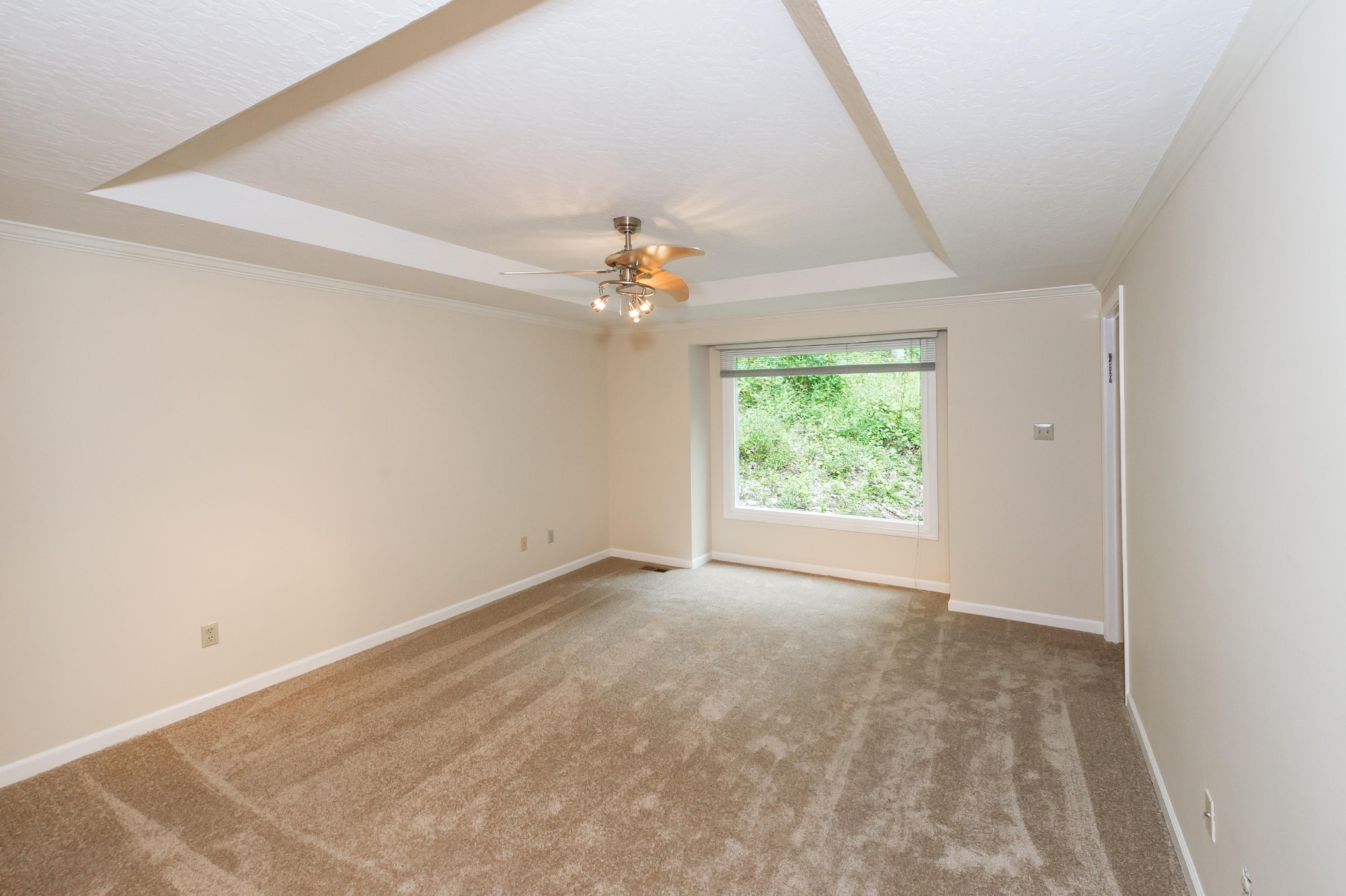 102 Clayton Way Oak Ridge, TN 37830 - Photo 7 of 40 a view of an empty room with a window