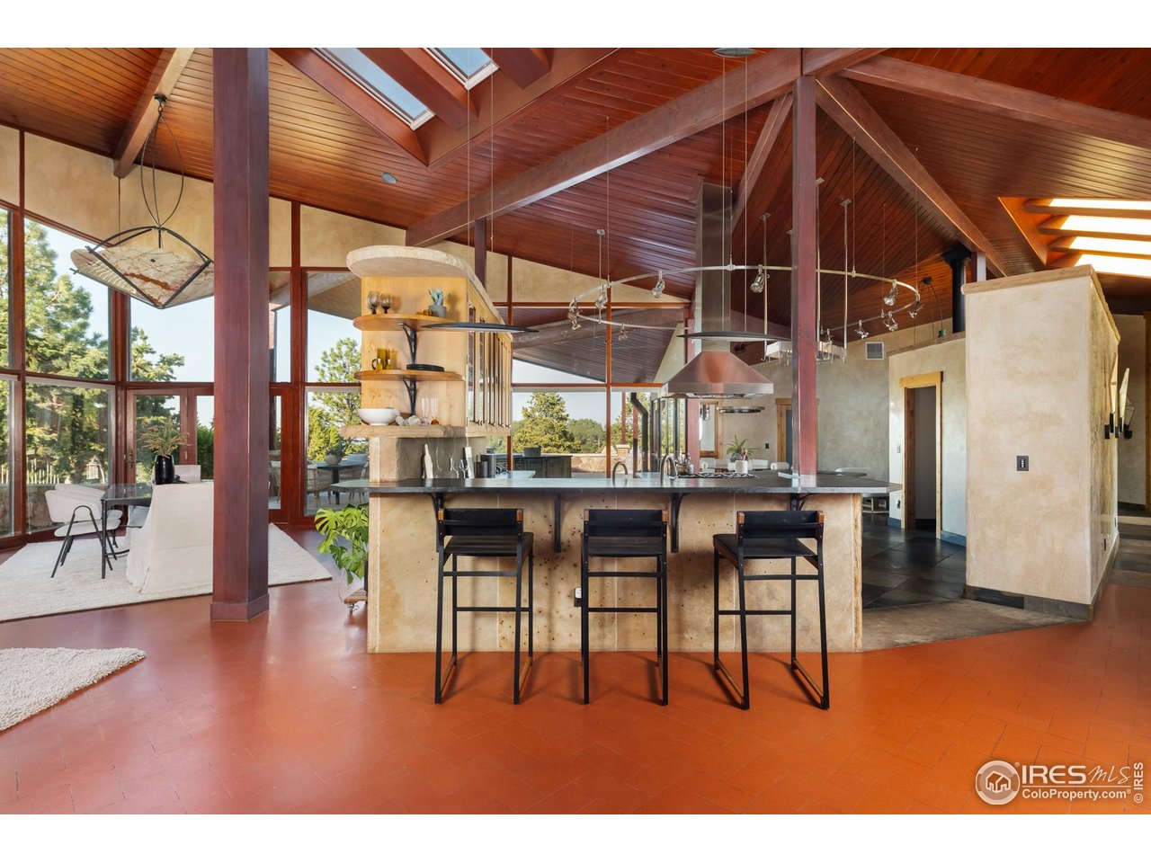 1530 Timber Lane Boulder, CO 80304 - Photo 12 of 50 a dinning table and chairs in the patio