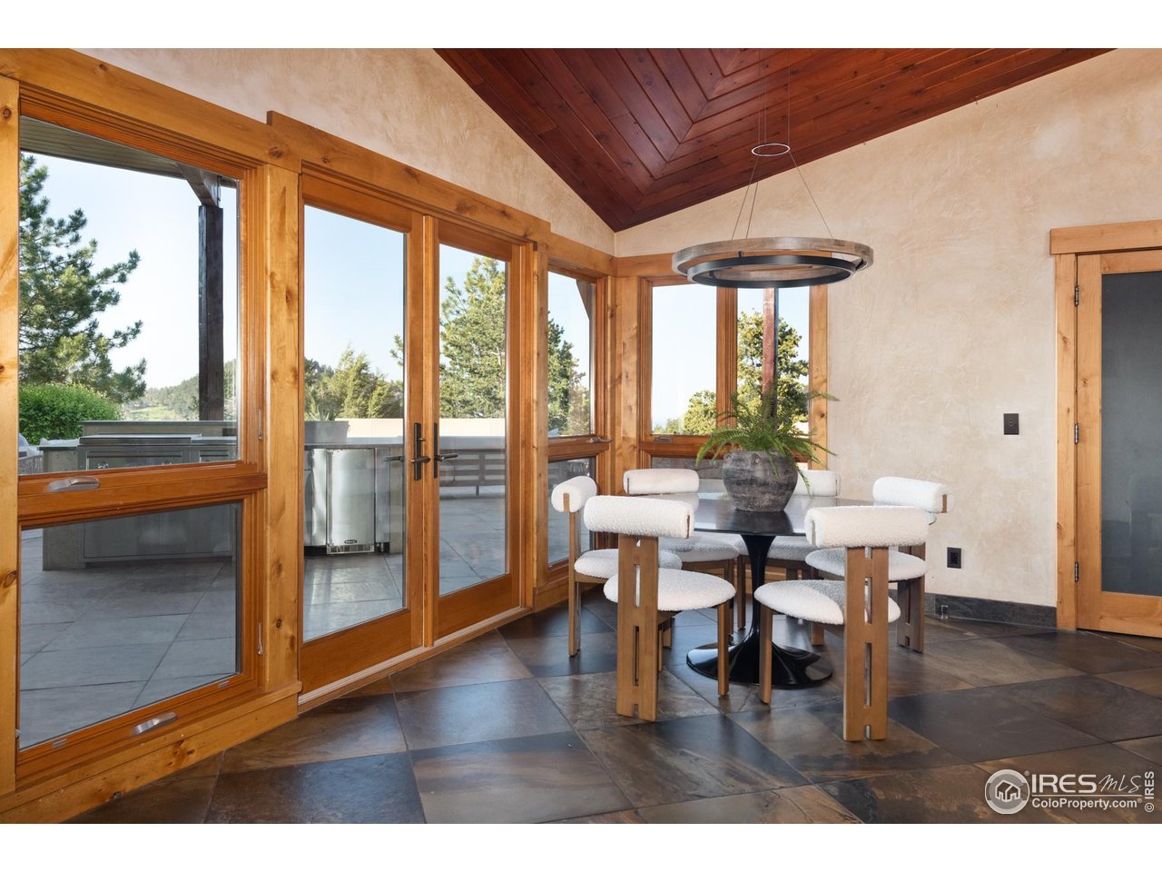 1530 Timber Lane Boulder, CO 80304 - Photo 14 of 50 a dining room with furniture and wooden floor