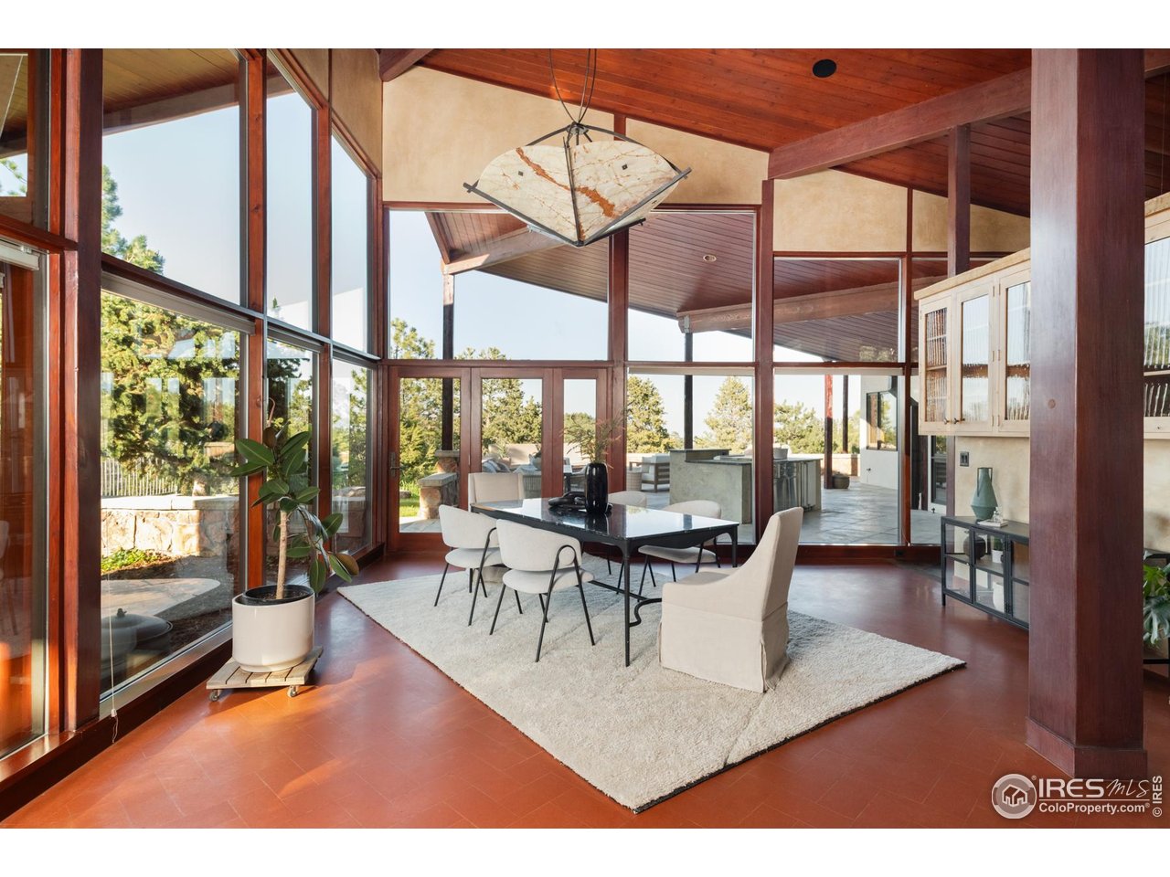 1530 Timber Lane Boulder, CO 80304 - Photo 16 of 50 a view of a dining room with furniture window and outside view
