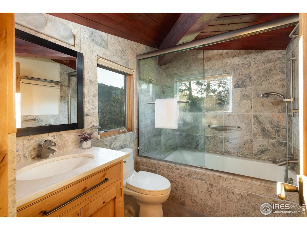 1530 Timber Lane Boulder, CO 80304 - Photo 33 of 50 a bathroom with a sink and a mirror
