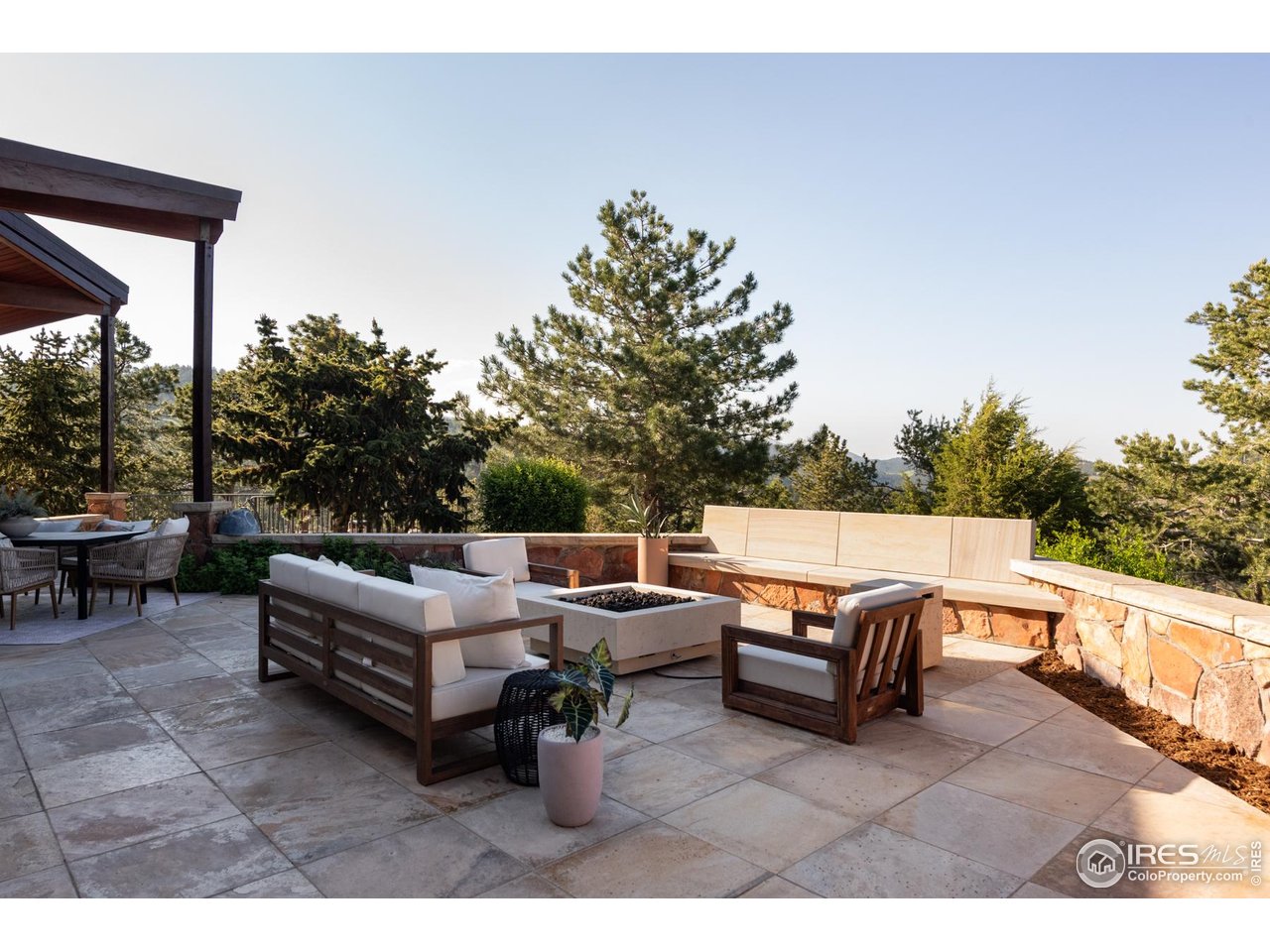 1530 Timber Lane Boulder, CO 80304 - Photo 9 of 50 a backyard of a house with fire pit and outdoor seating