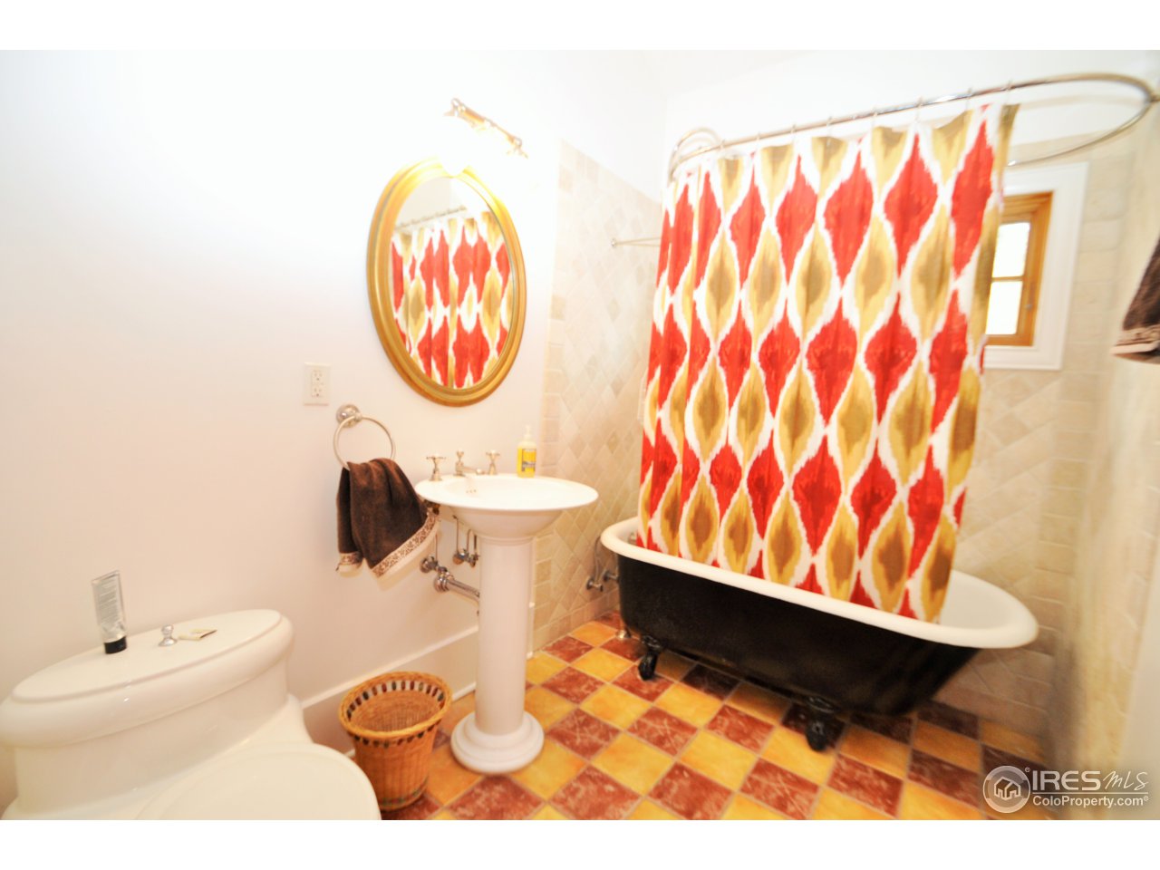 1689 County Road 83 Boulder, CO 80302 - Photo 13 of 17 a bathroom with a sink and a mirror