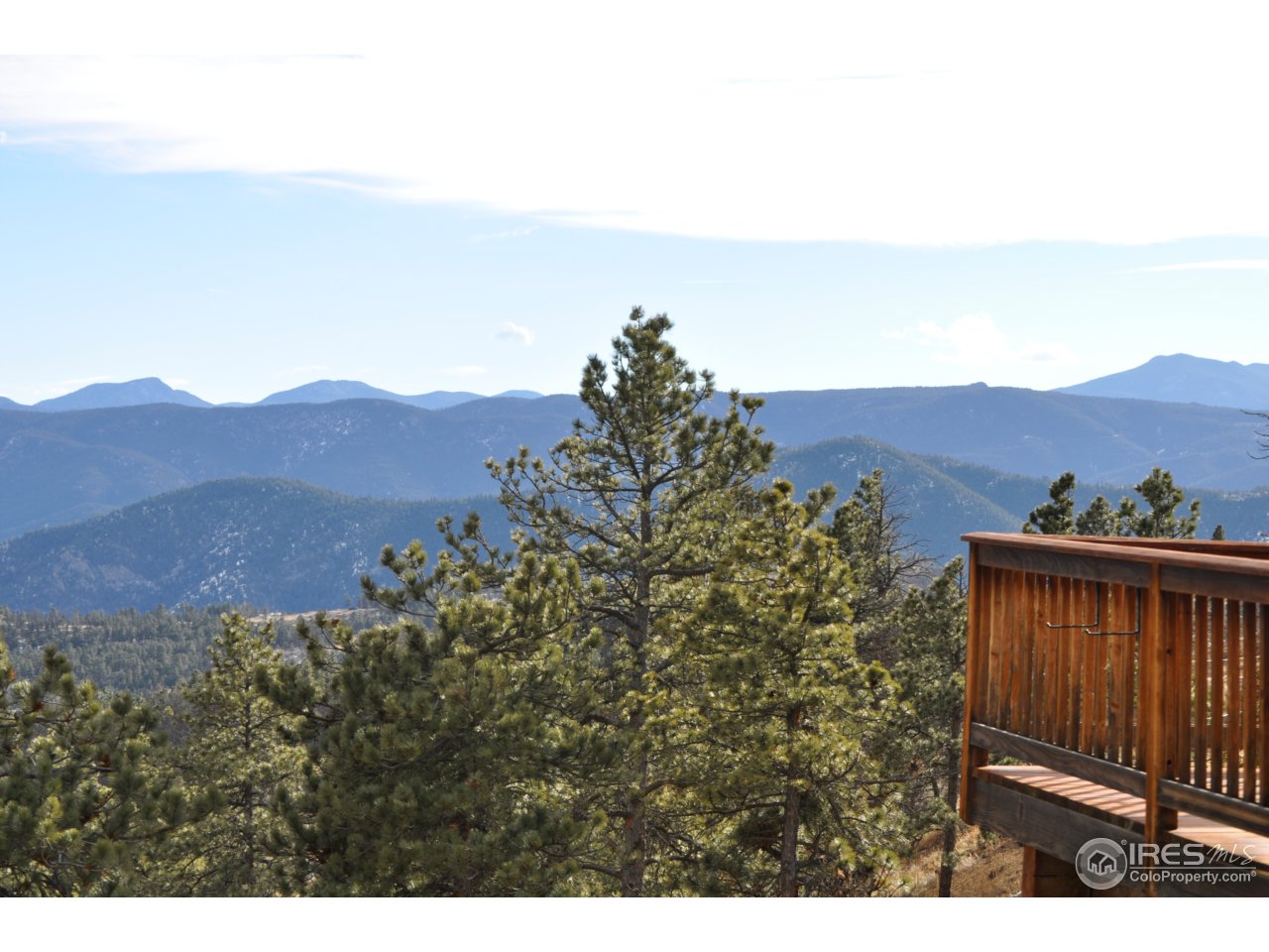 1689 County Road 83 Boulder, CO 80302 - Photo 15 of 17 a view of a mountain in the distance