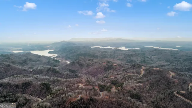a view of city and mountain in the distance