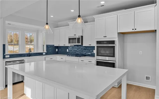 $600,000 | 8607 Lemur Lane, Summerfield, NC 27358