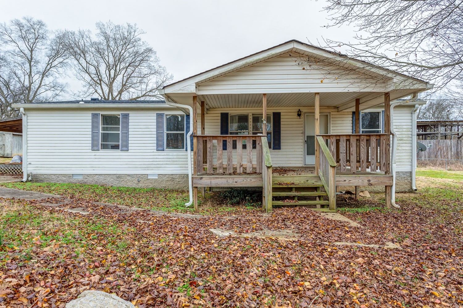 5655 South Commerce Road Watertown, TN 37184 - Photo 1 of 21 a front view of a house with garden