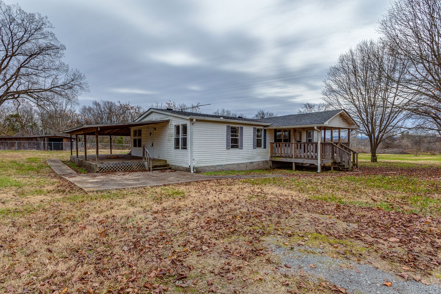 5655 South Commerce Road Watertown, TN 37184 - Photo 2 of 21 a view of a house with backyard and sitting area